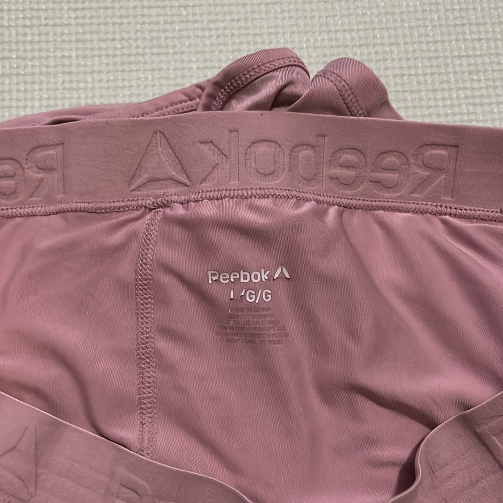 Women’s Reebok pink shorts with lining size Large